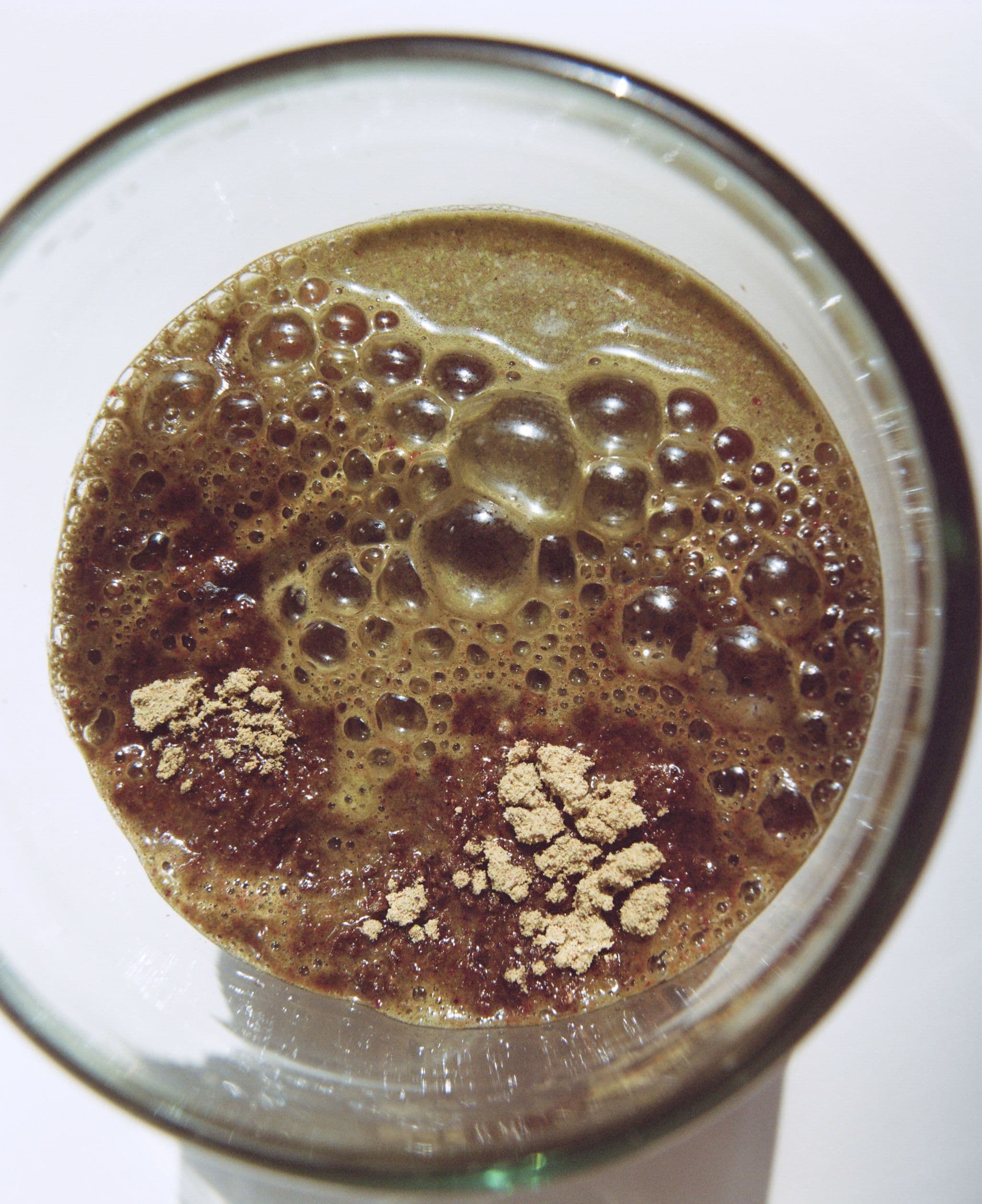 Ultimate Foundation powder mixed with Water in glass